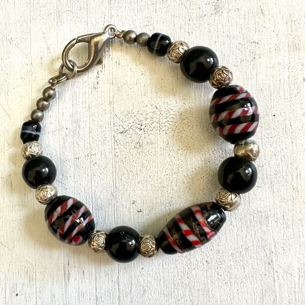 Black beaded silver tone bracelet